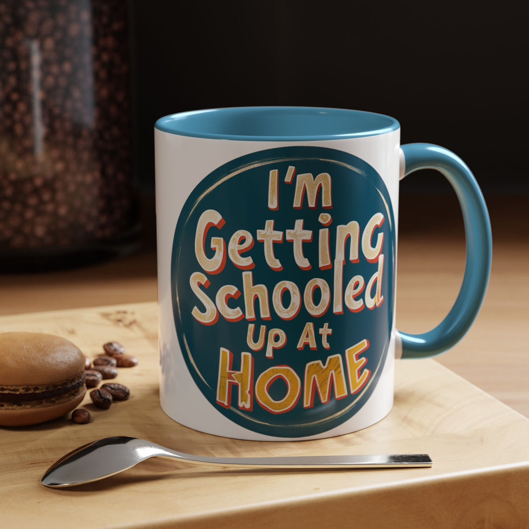 a mug on a cutting board. The mug is captioned with the words I'm Getting Schooled Up At Home