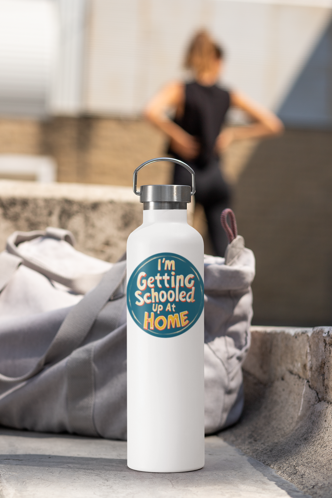 An white insulated water bottle with the caption of I'm Getting Schooled Up At Home for homeschool