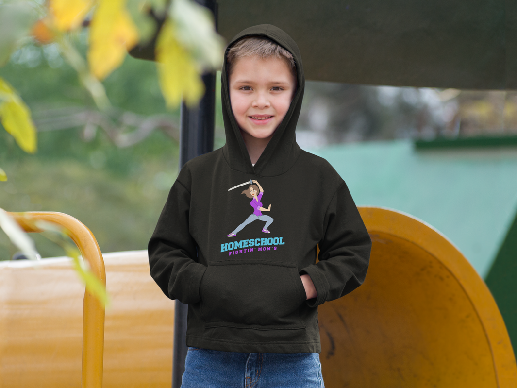 a smiling boy wearing a black hoodie with the words homeschool fighitin mom's