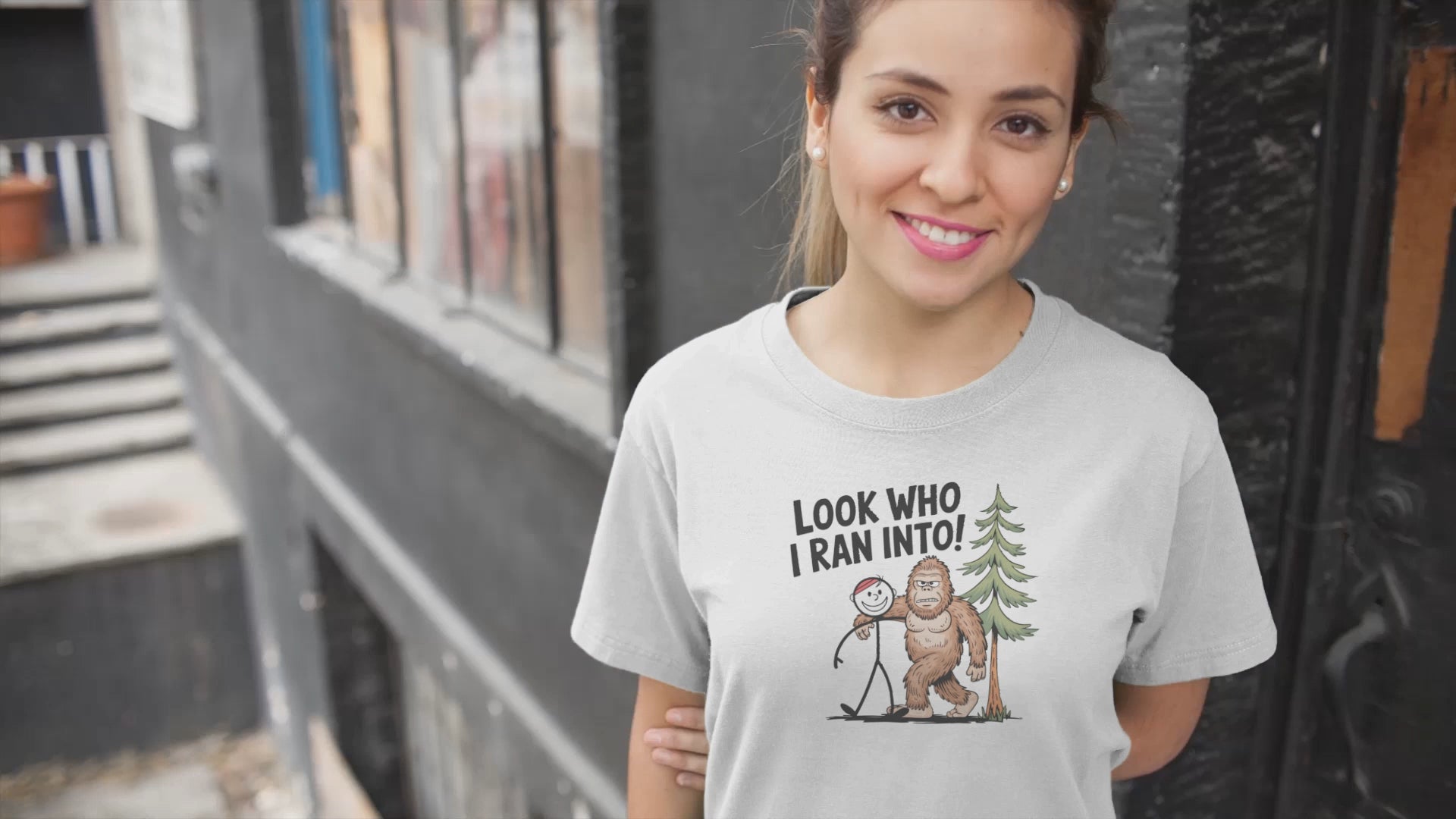 a video of young pretty woman wearing a Funny Look Who I Ran Into Bigfoot T-Shirt